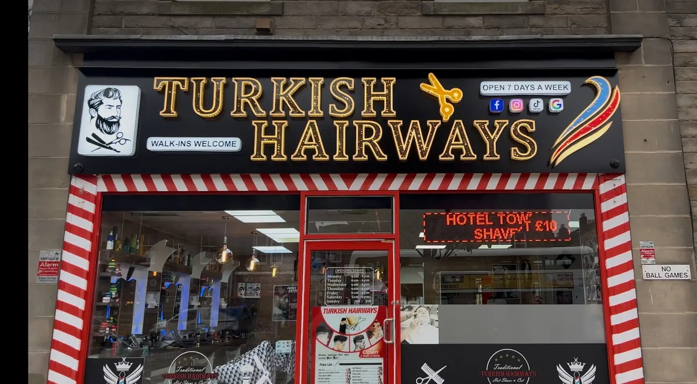 Turkish Hairways gold marquee sign above the shop on Portobello High Street